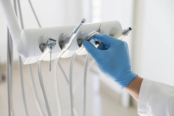 Professional Tooth Extraction technician working in Spencer, OK